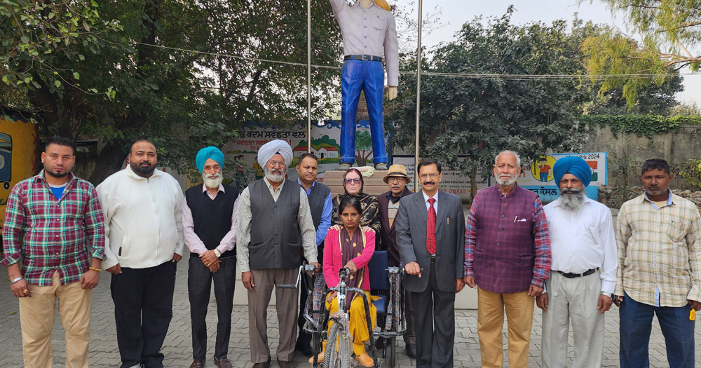 Tricycle presented to disabled Jaswinder Kaur Myra at Shaheed Bhagat Singh Memorial
